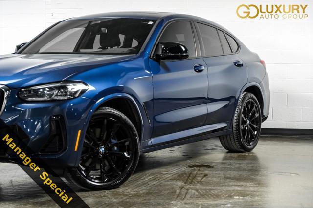 used 2023 BMW X4 car, priced at $54,587