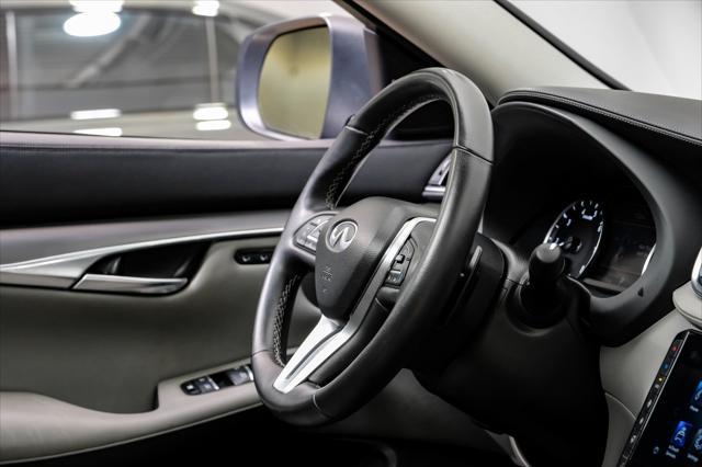 used 2023 INFINITI QX50 car, priced at $29,995