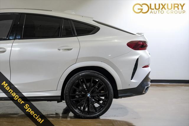 used 2022 BMW X6 car, priced at $59,998