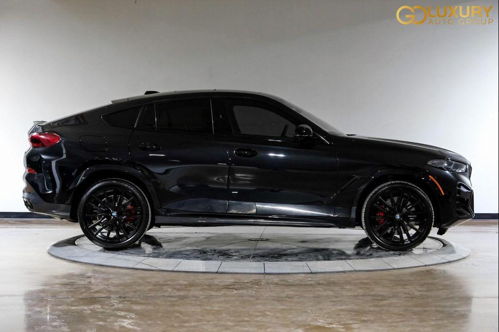used 2025 BMW X6 car, priced at $82,995