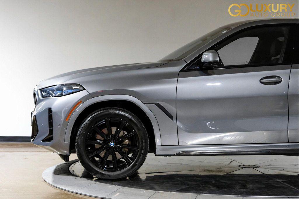 used 2025 BMW X6 car, priced at $55,995