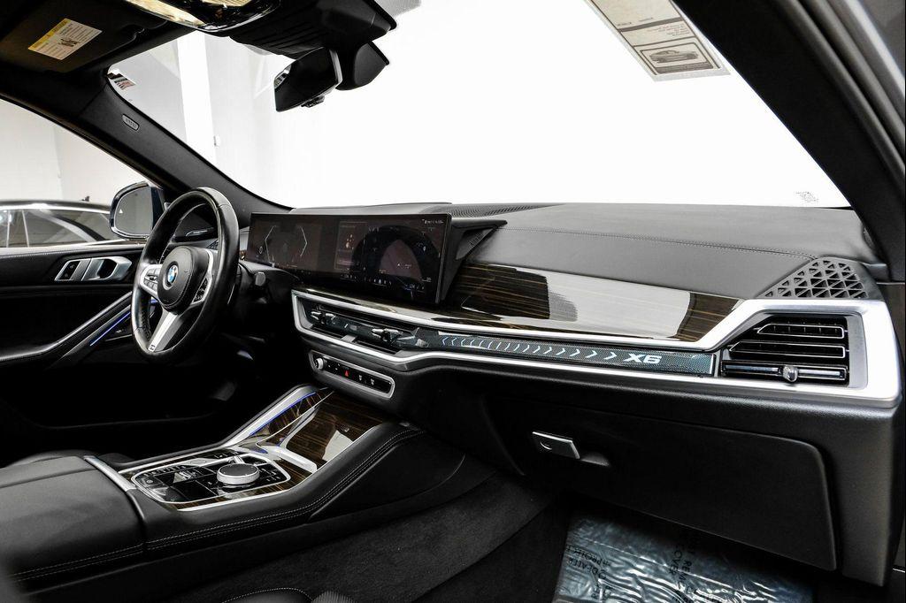 used 2025 BMW X6 car, priced at $55,995