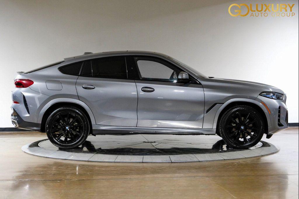 used 2025 BMW X6 car, priced at $55,995