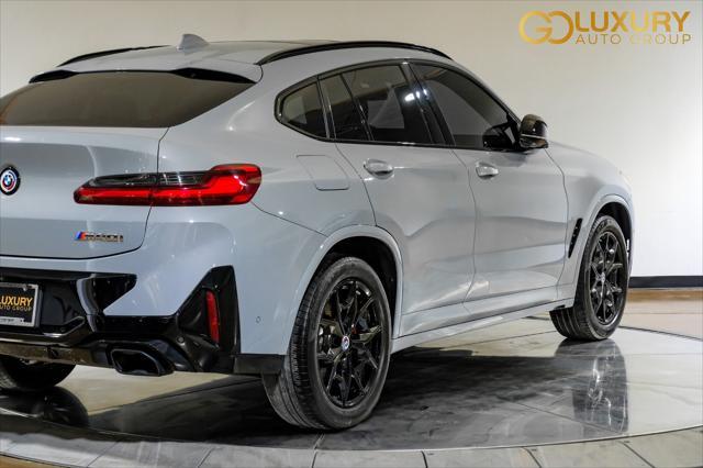used 2023 BMW X4 car, priced at $55,995