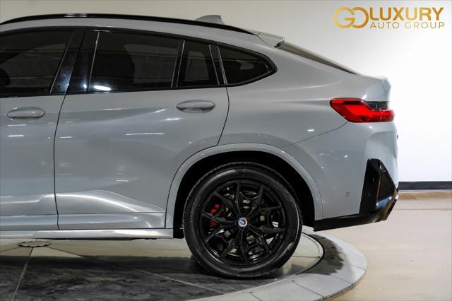 used 2023 BMW X4 car, priced at $55,995