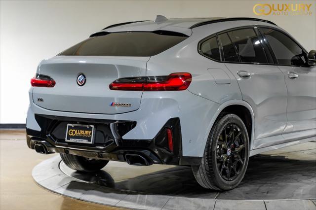 used 2023 BMW X4 car, priced at $55,995