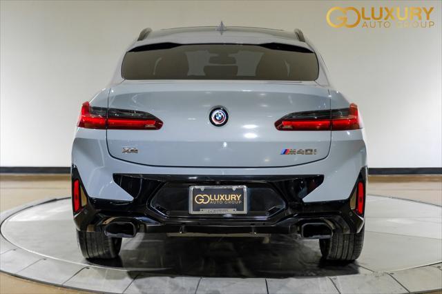 used 2023 BMW X4 car, priced at $55,995