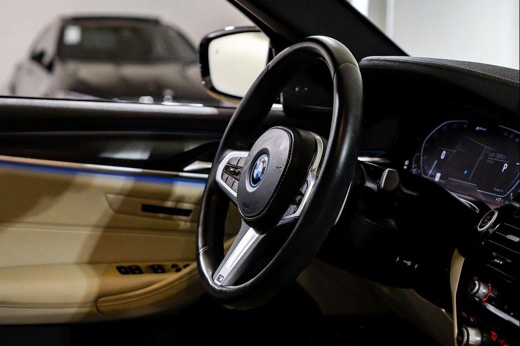 used 2023 BMW 530e car, priced at $35,995