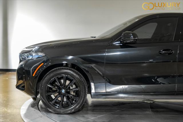 used 2025 BMW X6 car, priced at $59,995