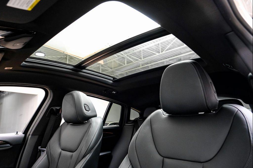 used 2024 BMW X4 car, priced at $37,595