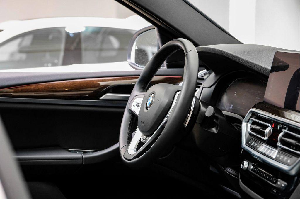 used 2024 BMW X4 car, priced at $37,595