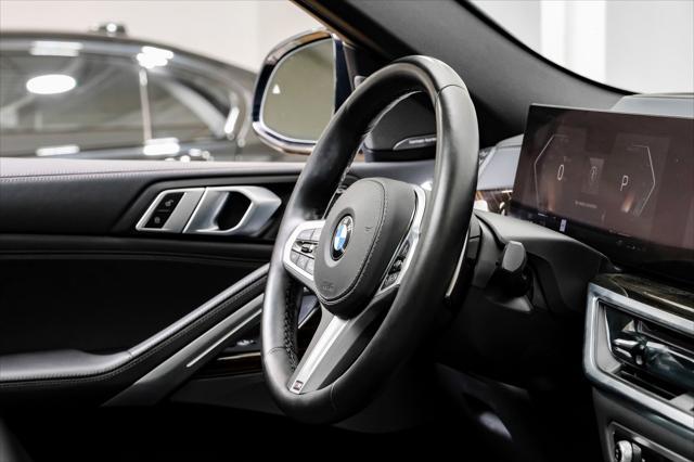 used 2025 BMW X6 car, priced at $59,995