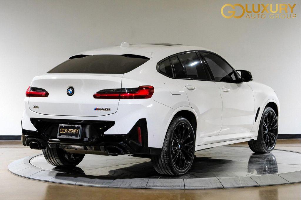 used 2024 BMW X4 car, priced at $56,586