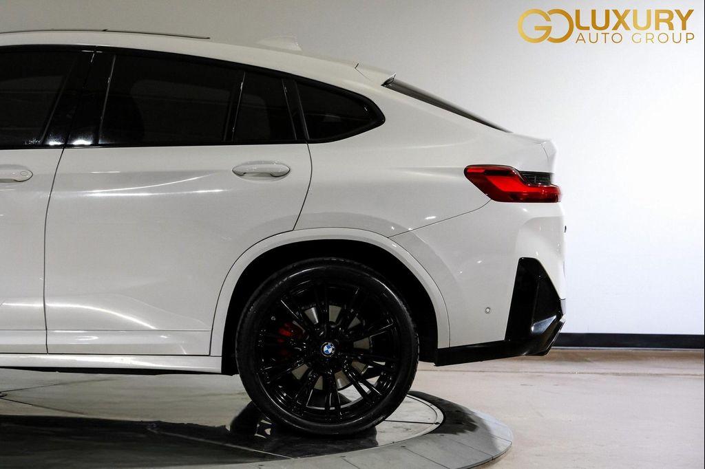 used 2024 BMW X4 car, priced at $56,586