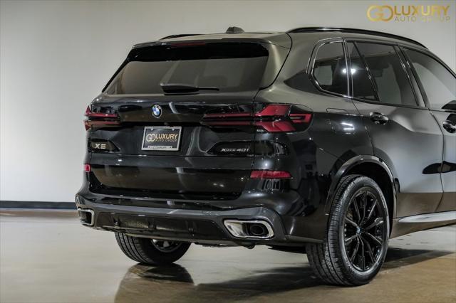 used 2025 BMW X5 car, priced at $68,995