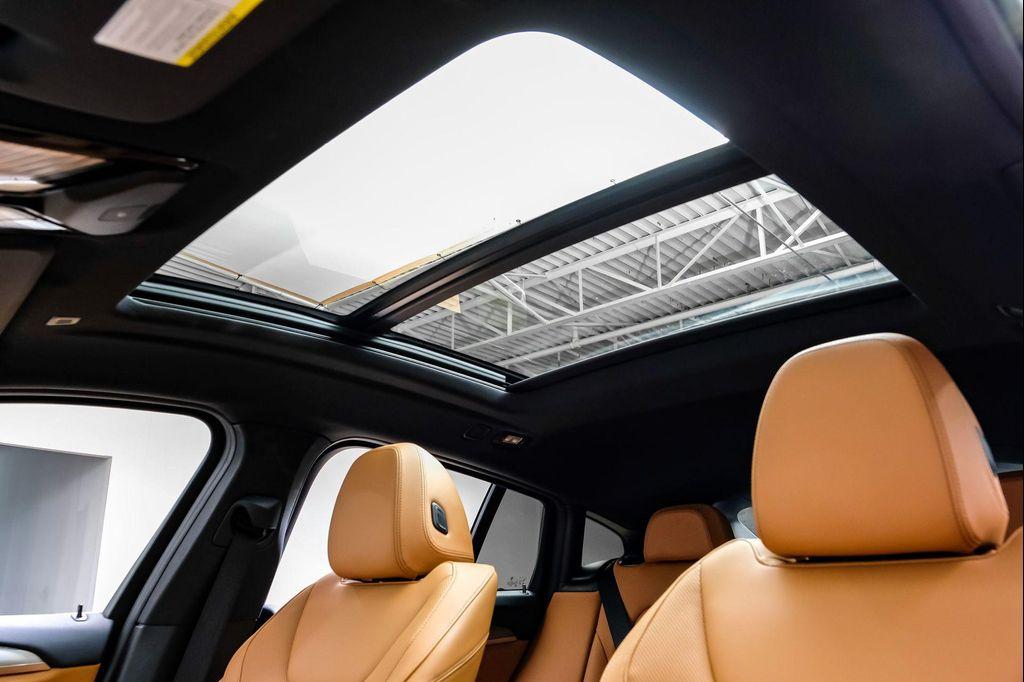 used 2025 BMW X4 car, priced at $42,995