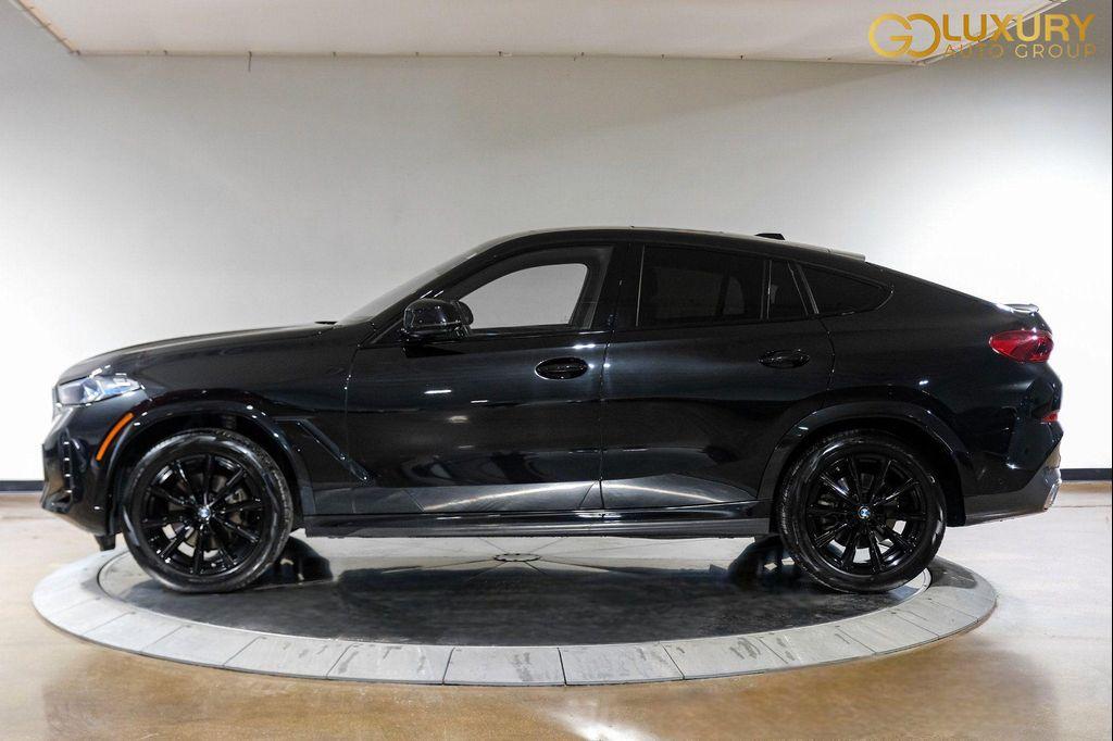 used 2025 BMW X6 car, priced at $55,995