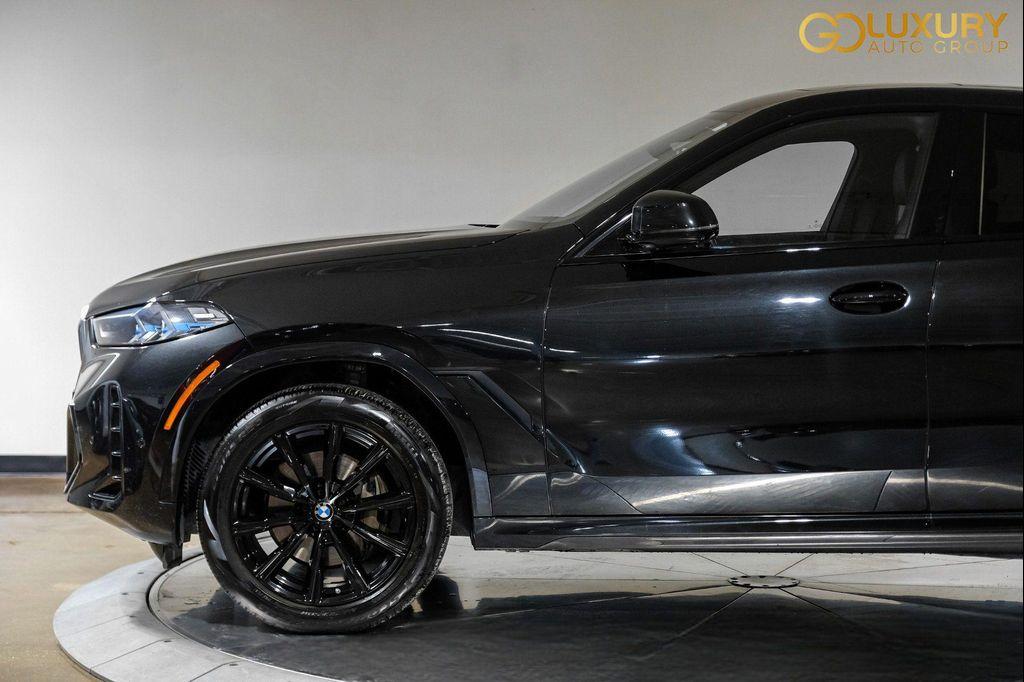 used 2025 BMW X6 car, priced at $55,995