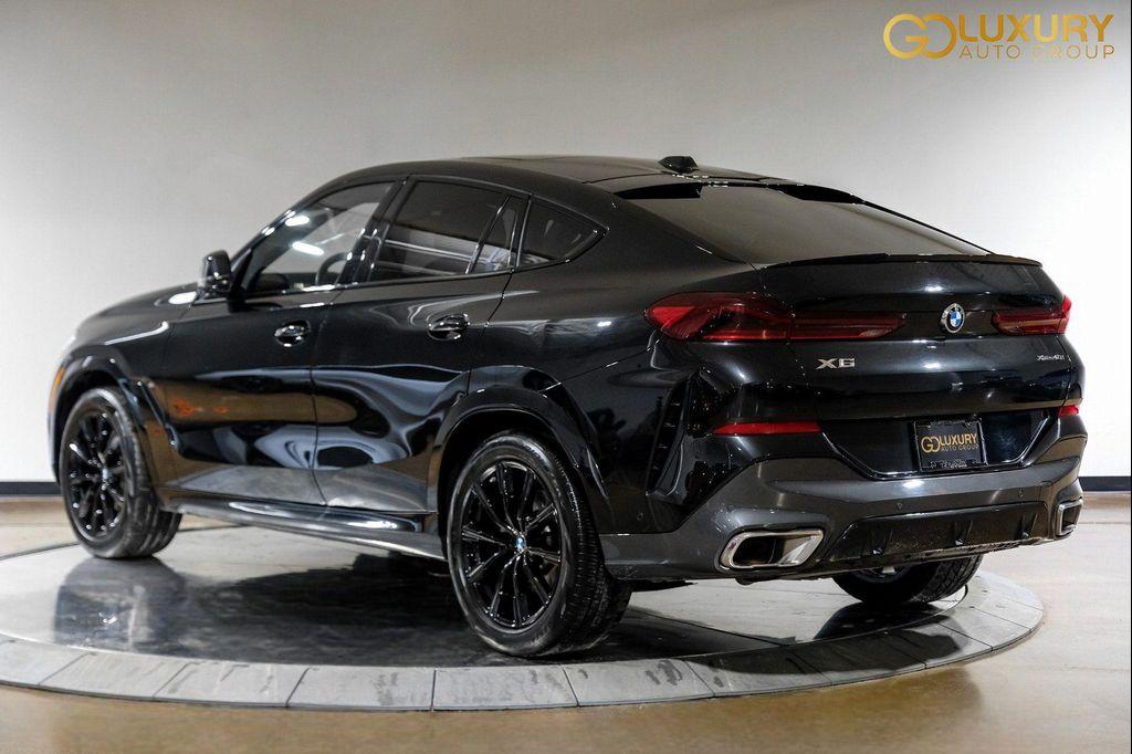 used 2025 BMW X6 car, priced at $55,995