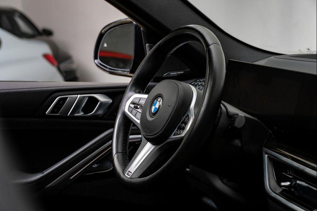 used 2025 BMW X6 car, priced at $55,995