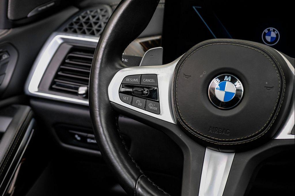 used 2025 BMW X6 car, priced at $55,995