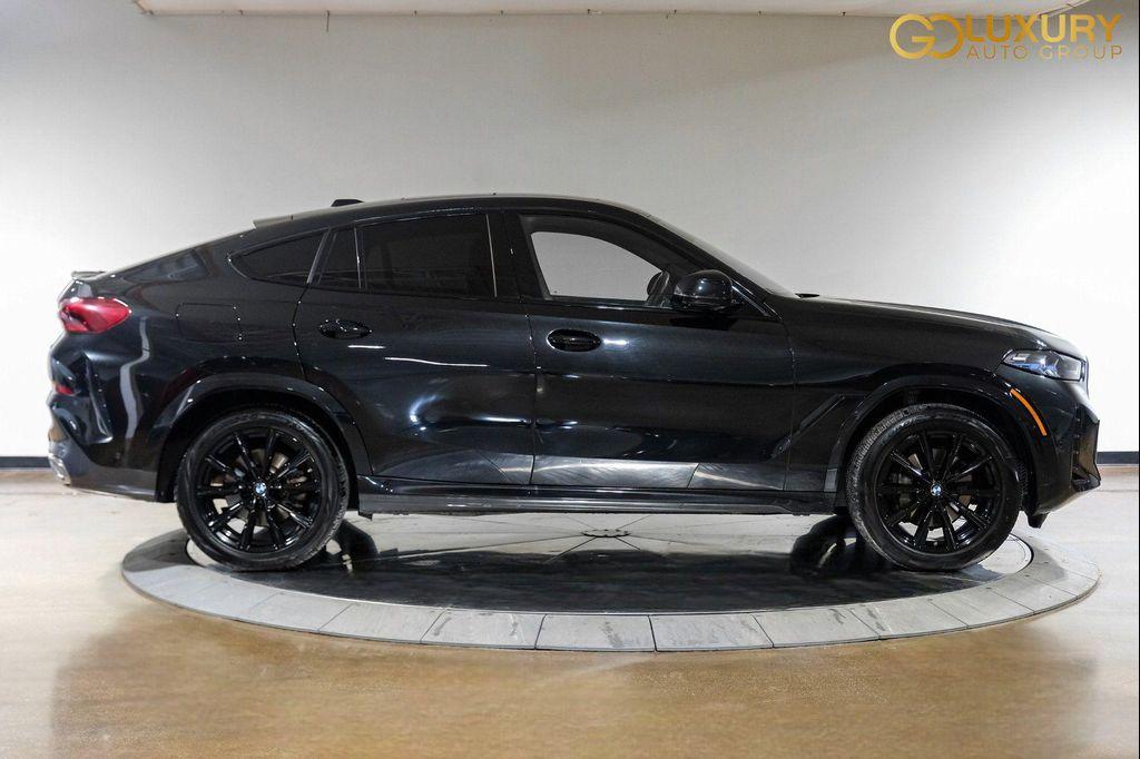 used 2025 BMW X6 car, priced at $55,995