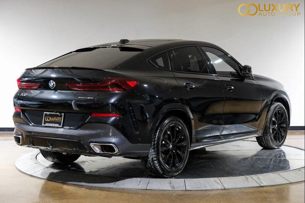 used 2025 BMW X6 car, priced at $55,995