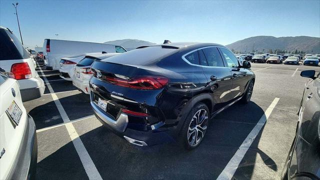 used 2023 BMW X6 car, priced at $63,889