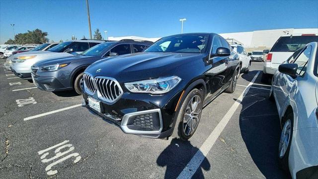 used 2023 BMW X6 car, priced at $63,889