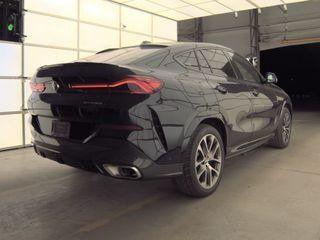 used 2025 BMW X6 car, priced at $56,995