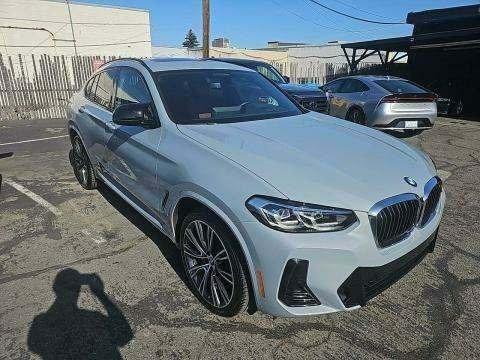 used 2023 BMW X4 car, priced at $56,995