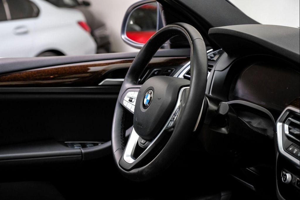 used 2024 BMW X4 car, priced at $37,995