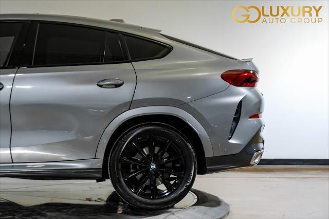 used 2025 BMW X6 car, priced at $62,995
