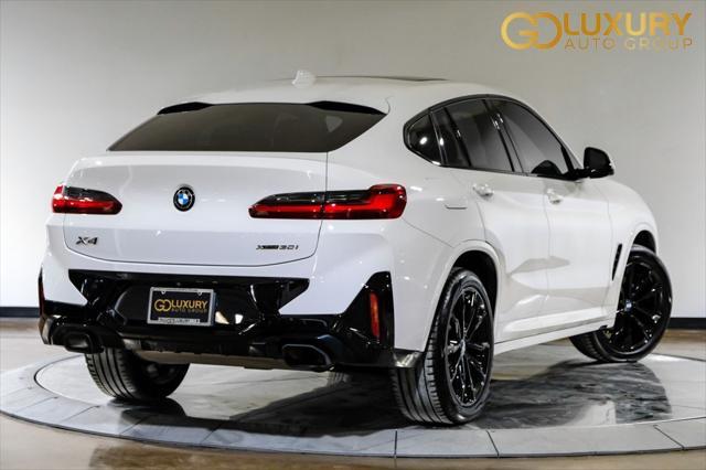 used 2023 BMW X4 car, priced at $44,995