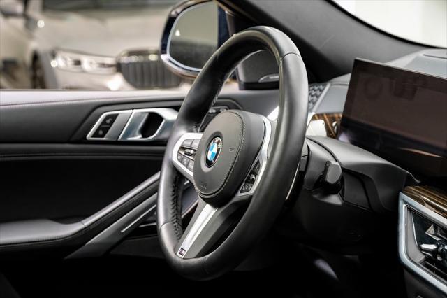 used 2025 BMW X6 car, priced at $62,995