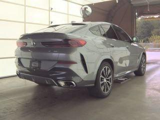 used 2025 BMW X6 car, priced at $57,995