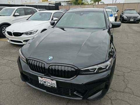 used 2023 BMW 330e car, priced at $40,599