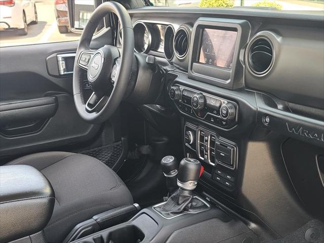 used 2023 Jeep Wrangler 4xe car, priced at $28,300