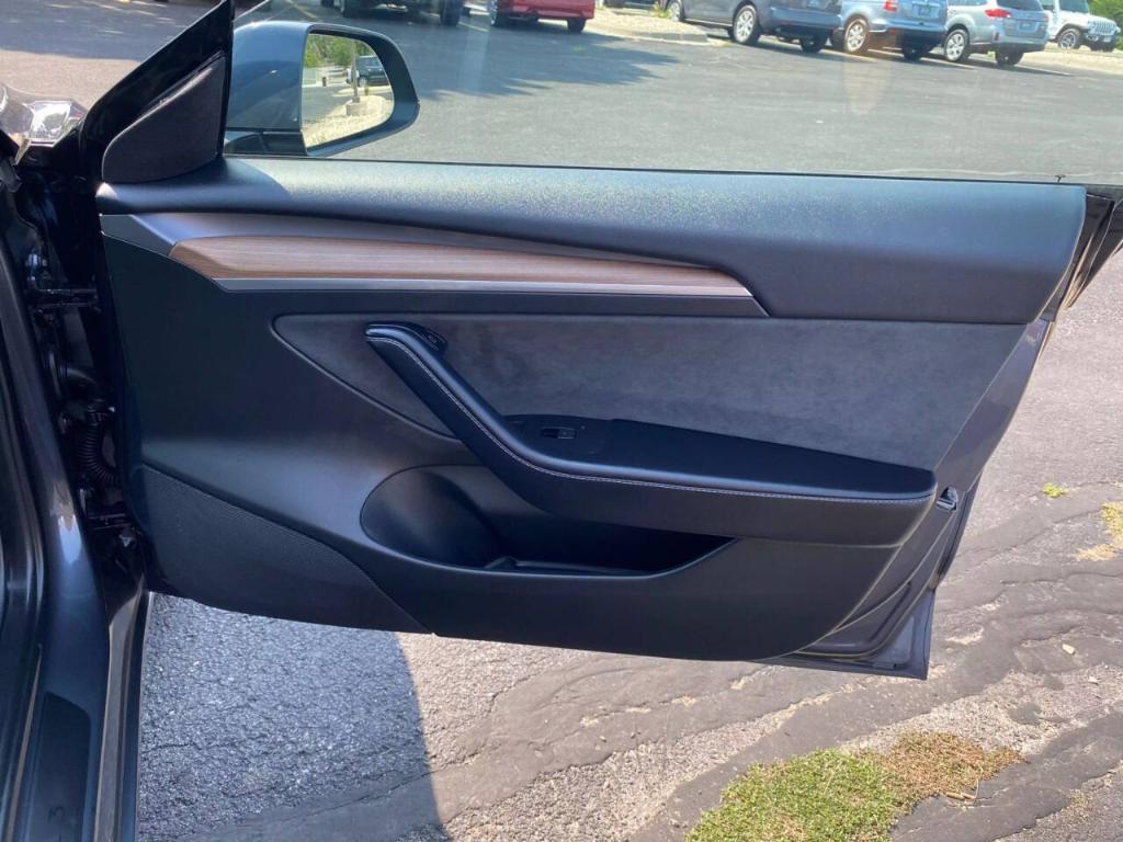 used 2022 Tesla Model 3 car, priced at $28,500