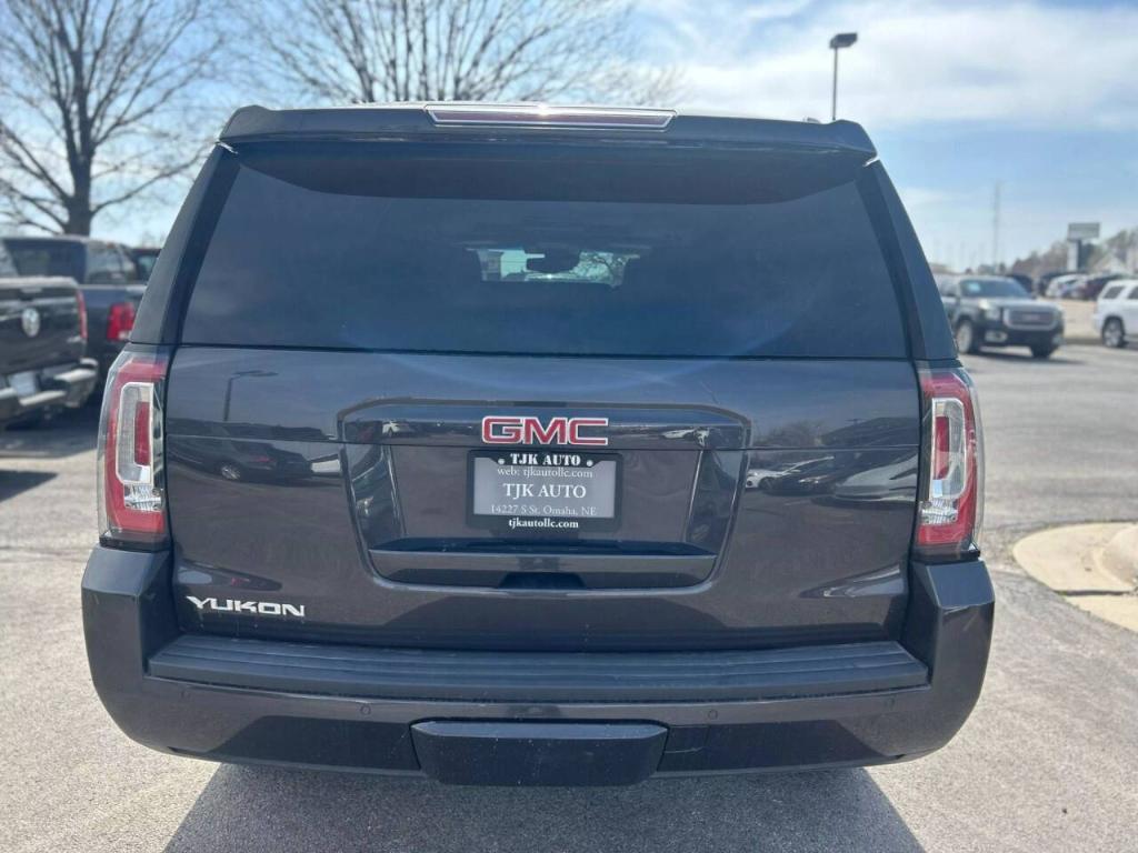 used 2018 GMC Yukon car, priced at $29,950