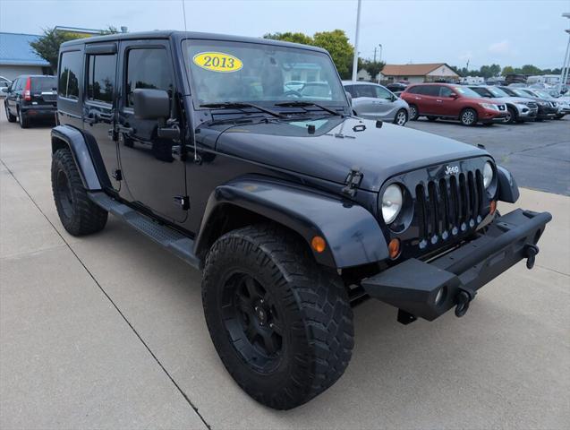 used 2013 Jeep Wrangler Unlimited car, priced at $16,995