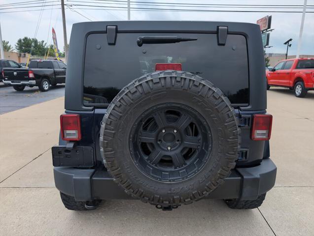 used 2013 Jeep Wrangler Unlimited car, priced at $16,995