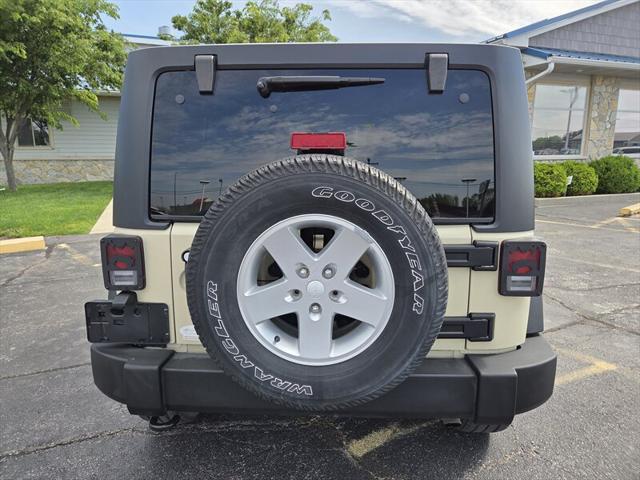 used 2011 Jeep Wrangler Unlimited car, priced at $12,995