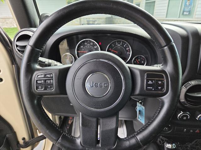 used 2011 Jeep Wrangler Unlimited car, priced at $12,995