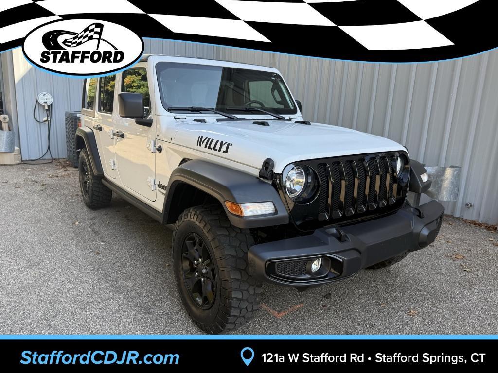 used 2021 Jeep Wrangler Unlimited car, priced at $31,830