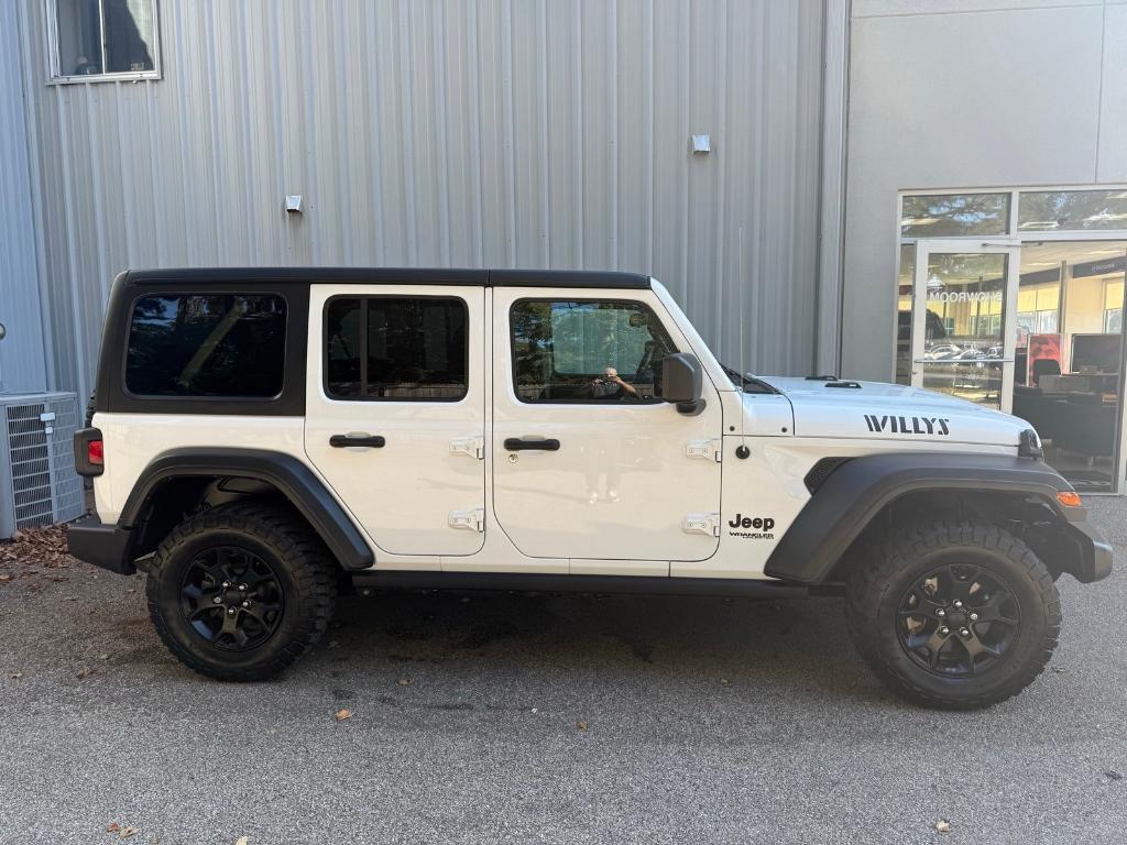 used 2021 Jeep Wrangler Unlimited car, priced at $31,830