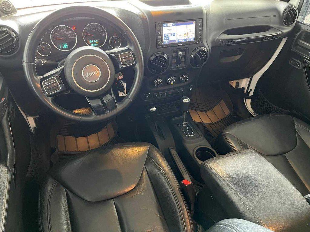 used 2014 Jeep Wrangler Unlimited car, priced at $16,990