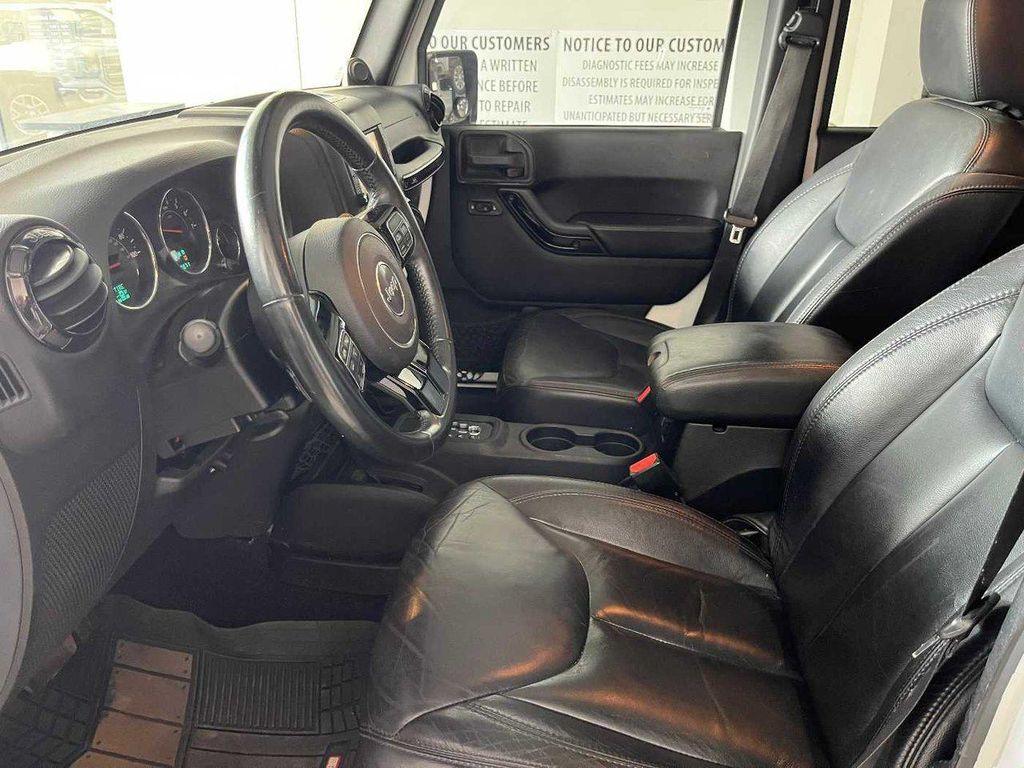used 2014 Jeep Wrangler Unlimited car, priced at $16,990