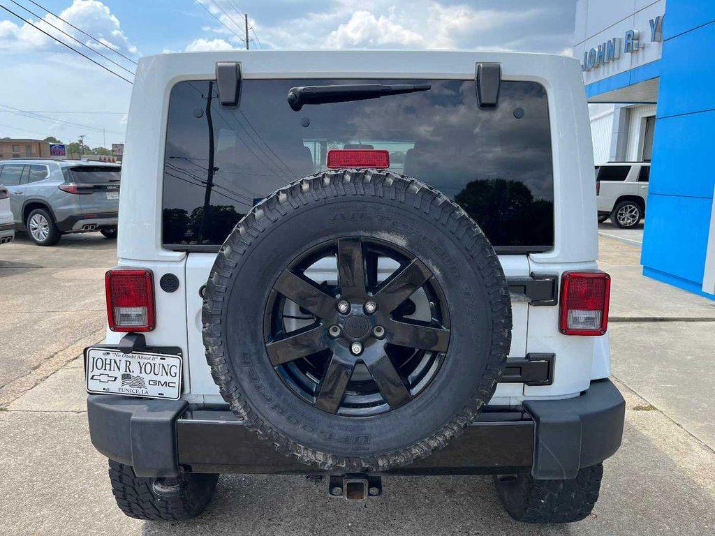 used 2014 Jeep Wrangler Unlimited car, priced at $16,990