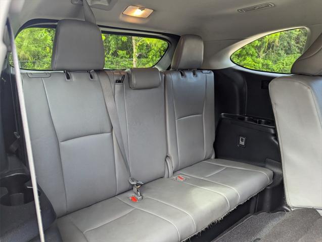 used 2020 Toyota Highlander Hybrid car, priced at $28,891